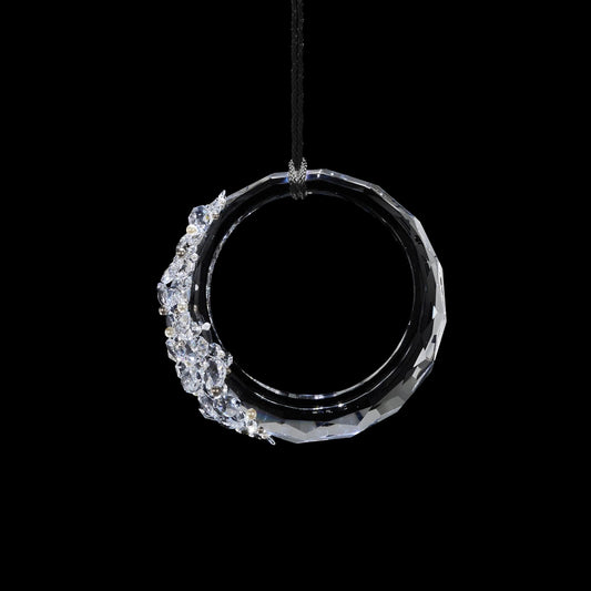 A RING OF CRYSTAL ENHANCED WITH SWAROVSKI PEARLS