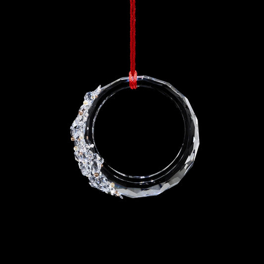 A RING OF CRYSTAL ENHANCED WITH SWAROVSKI PEARLS