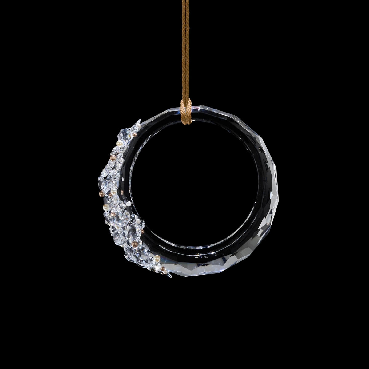 A RING OF CRYSTAL ENHANCED WITH SWAROVSKI PEARLS