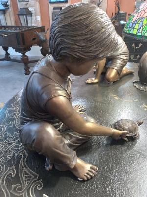 BOY WITH A TURTLE